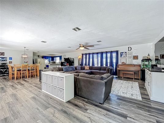 Dining room, Interior, Living room, Pendant Lights, Piano, Wood Texture Flooring