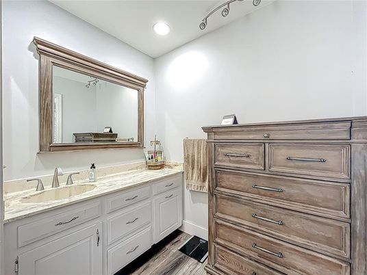 Bathroom, Dual Sink Vanities, Interior, Recessed Lighting, Wood Texture Flooring