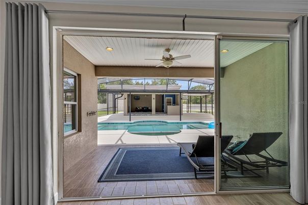 Interior, Pool, Recessed Lighting, Sun Room, Wood Texture Flooring