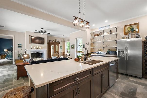 Fireplace, Interior, Kitchen, Living room, Pendant Lights, Recessed Lighting, Stainless Steel Appliances
