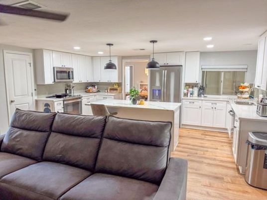 Interior, Kitchen, Living room, Pendant Lights, Recessed Lighting, Stainless Steel Appliances, Wood Texture Flooring