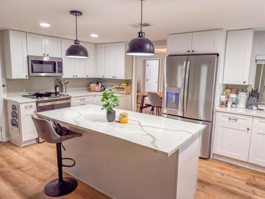 Interior, Kitchen, Pendant Lights, Recessed Lighting, Stainless Steel Appliances, Wood Texture Flooring