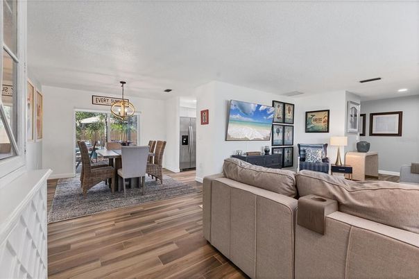 Dining room, Interior, Living room, Pendant Lights, Recessed Lighting, Wood Texture Flooring