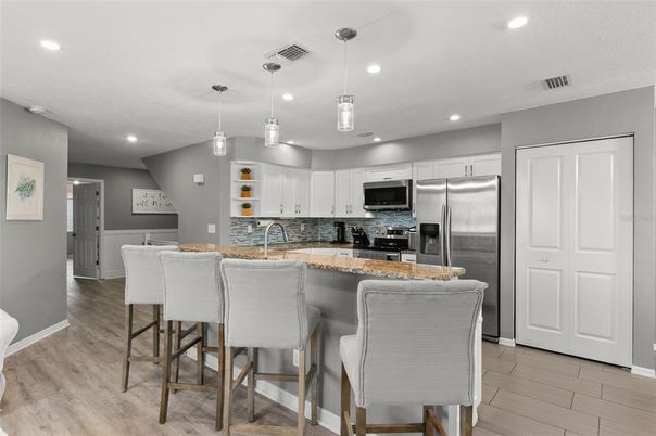 Interior, Kitchen, Pendant Lights, Recessed Lighting, Stainless Steel Appliances, Wood Texture Flooring