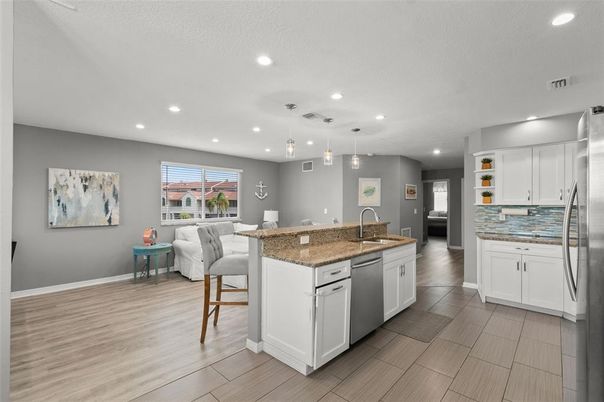 Interior, Kitchen, Pendant Lights, Recessed Lighting, Stainless Steel Appliances, Wood Texture Flooring