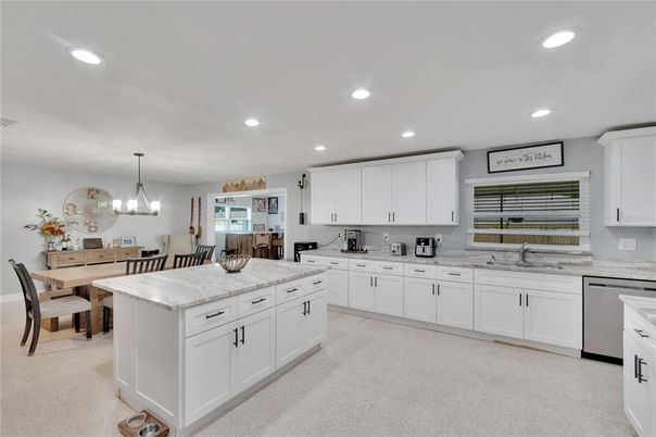 Chandelier, Dining room, Interior, Kitchen, Pendant Lights, Recessed Lighting, Stainless Steel Appliances