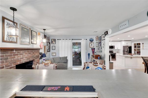 Fireplace, Interior, Kitchen, Pendant Lights, Recessed Lighting, Stainless Steel Appliances