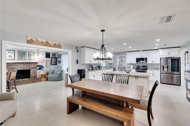 Dining room, Fireplace, Interior, Kitchen, Living room, Pendant Lights, Recessed Lighting, Stainless Steel Appliances, Stone Walls