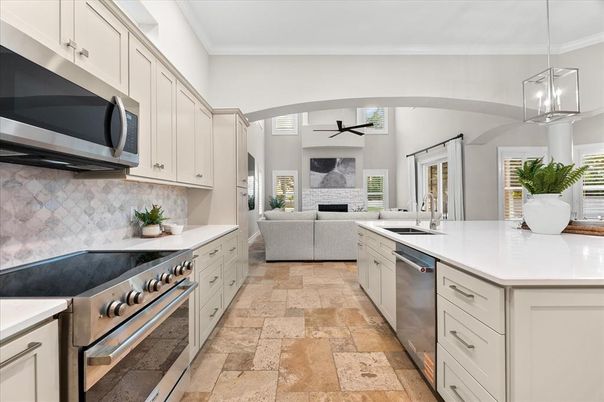 Fireplace, Interior, Kitchen, Living room, Pendant Lights, Stainless Steel Appliances