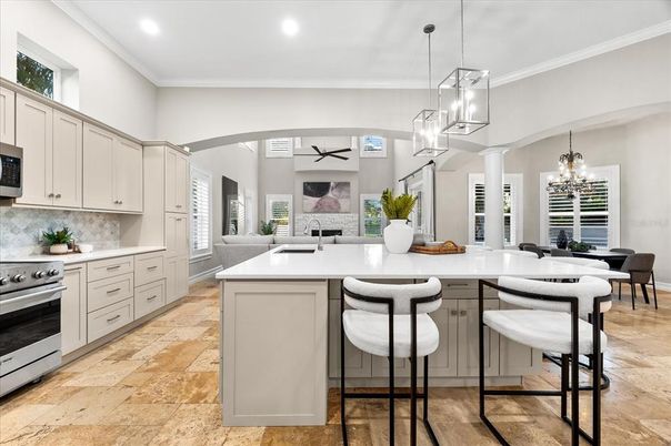 Chandelier, Dining room, Interior, Kitchen, Pendant Lights, Recessed Lighting, Stainless Steel Appliances