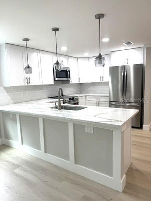 Interior, Kitchen, Pendant Lights, Recessed Lighting, Stainless Steel Appliances, Wood Texture Flooring