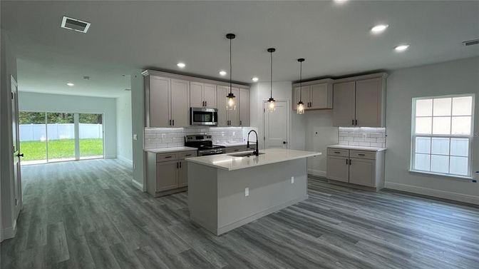 Interior, Kitchen, Pendant Lights, Recessed Lighting, Stainless Steel Appliances, Wood Texture Flooring