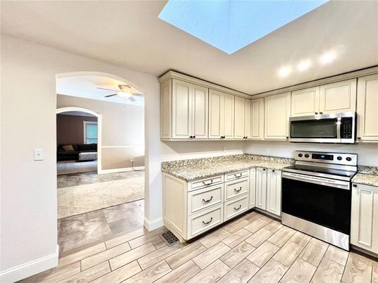 Interior, Kitchen, Recessed Lighting, Stainless Steel Appliances, Wood Texture Flooring
