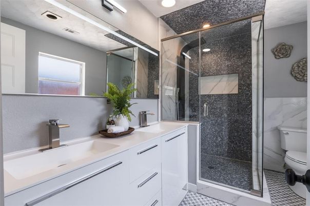 Bathroom, Dual Sink Vanities, Glass Shower, Interior, Marble Walls, Recessed Lighting