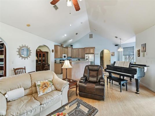 Interior, Kitchen, Living room, Pendant Lights, Piano, Recessed Lighting, Stainless Steel Appliances, Wood Texture Flooring