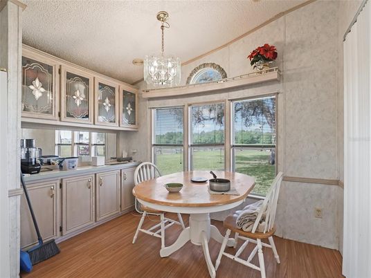 Chandelier, Dining room, Interior, Wood Texture Flooring
