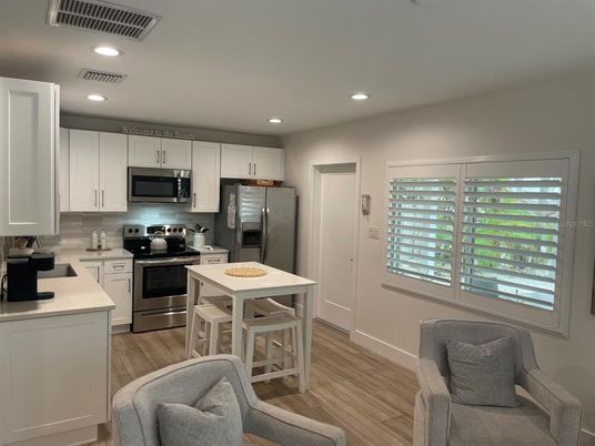 Interior, Kitchen, Recessed Lighting, Stainless Steel Appliances, Wood Texture Flooring