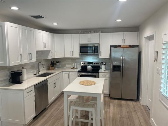 Interior, Kitchen, Recessed Lighting, Stainless Steel Appliances, Wood Texture Flooring