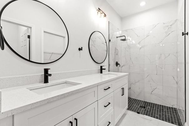Bathroom, Dual Sink Vanities, Glass Shower, Interior, Marble Walls, Recessed Lighting
