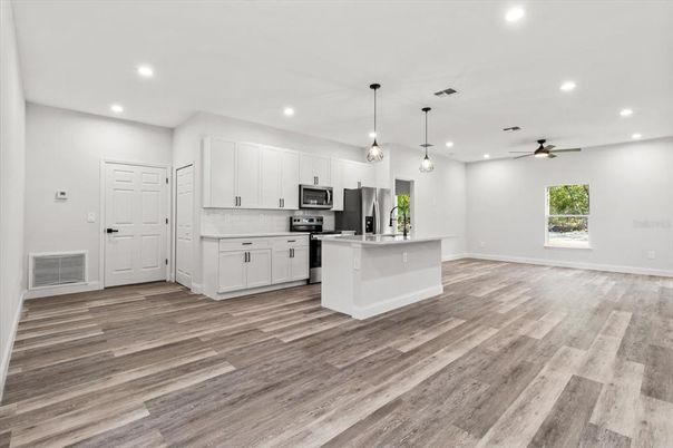 Interior, Kitchen, Pendant Lights, Recessed Lighting, Stainless Steel Appliances, Wood Texture Flooring