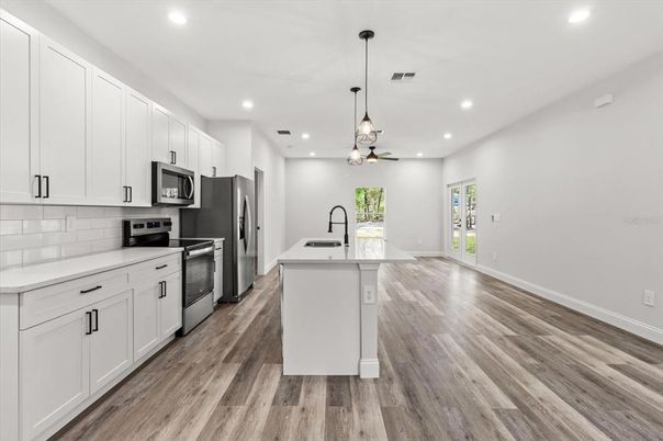 Interior, Kitchen, Pendant Lights, Recessed Lighting, Stainless Steel Appliances, Wood Texture Flooring
