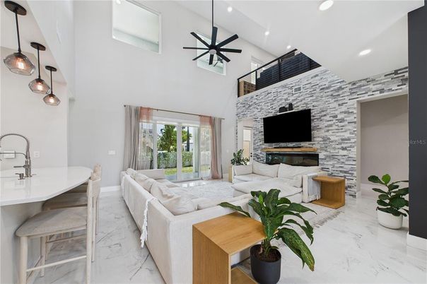 Fireplace, Interior, Living room, Marble, Pendant Lights, Recessed Lighting, Stone Walls