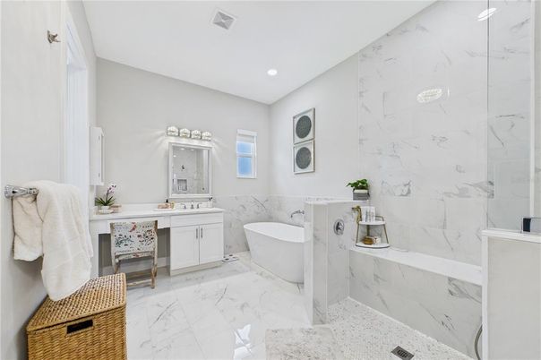 Bathroom, Dual Sink Vanities, Free Standing Baths, Interior, Marble, Marble Walls, Recessed Lighting