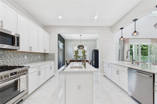 Dining room, Interior, Kitchen, Marble, Pendant Lights, Recessed Lighting, Stainless Steel Appliances