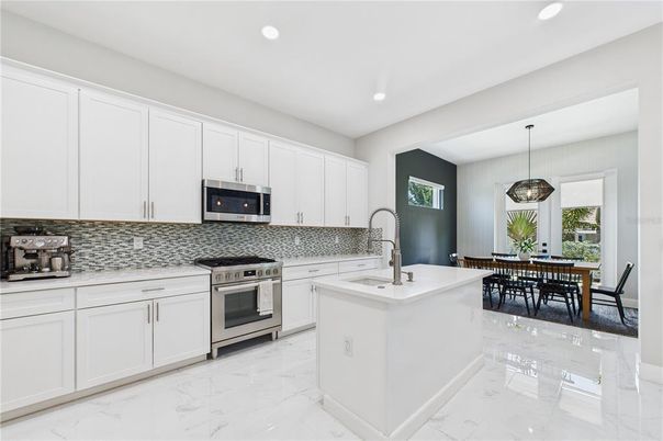 Dining room, Interior, Kitchen, Marble, Pendant Lights, Recessed Lighting, Stainless Steel Appliances