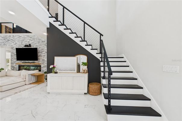 Fireplace, Interior, Marble, Recessed Lighting, Stone Walls