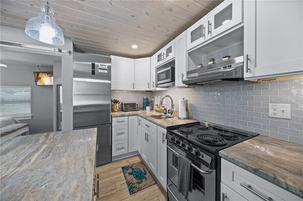 Interior, Kitchen, Pendant Lights, Recessed Lighting, Stainless Steel Appliances, Wooden Ceilings, Wood Texture Flooring