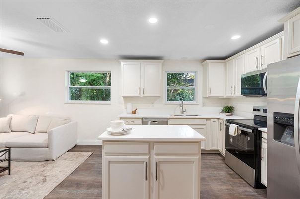 Interior, Kitchen, Recessed Lighting, Stainless Steel Appliances, Wood Texture Flooring