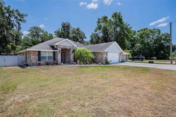 Attached, Backyard, Exterior, Facade, Brick Facade, Ranch