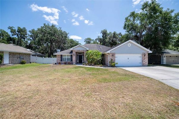 Attached, Backyard, Exterior, Facade, Brick Facade, Ranch