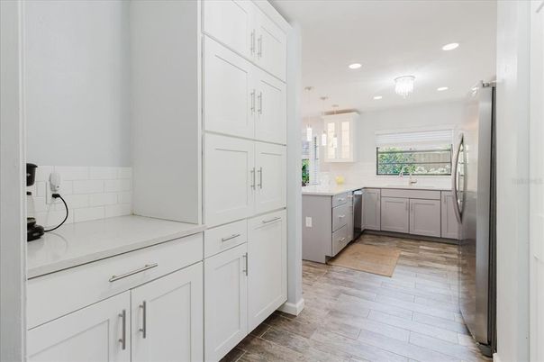 Interior, Kitchen, Recessed Lighting, Stainless Steel Appliances, Wood Texture Flooring