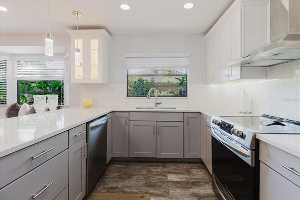 Interior, Kitchen, Pendant Lights, Recessed Lighting, Stainless Steel Appliances, Wood Texture Flooring
