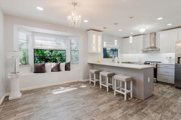 Chandelier, Interior, Kitchen, Pendant Lights, Recessed Lighting, Stainless Steel Appliances, Wood Texture Flooring
