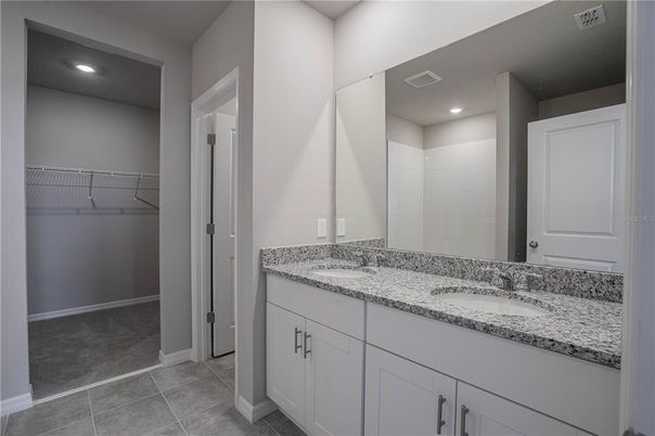 Bathroom, Dual Sink Vanities, Interior, Recessed Lighting, Walk-in Closets