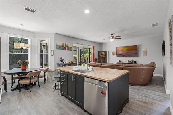 Dining room, Interior, Kitchen, Living room, Pendant Lights, Recessed Lighting, Wood Texture Flooring