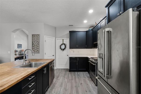 Interior, Kitchen, Recessed Lighting, Stainless Steel Appliances, Wood Texture Flooring