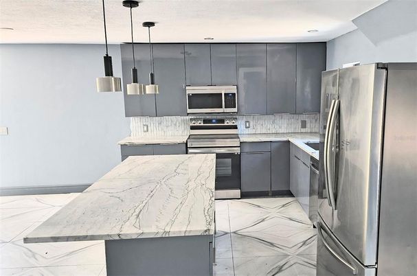 Interior, Kitchen, Marble, Pendant Lights, Recessed Lighting, Stainless Steel Appliances