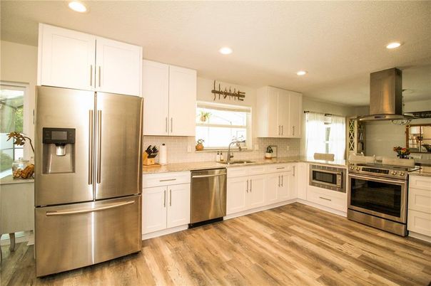 Interior, Kitchen, Recessed Lighting, Stainless Steel Appliances, Wood Texture Flooring