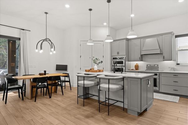 Dining room, Interior, Kitchen, Pendant Lights, Recessed Lighting, Stainless Steel Appliances, Wood Texture Flooring