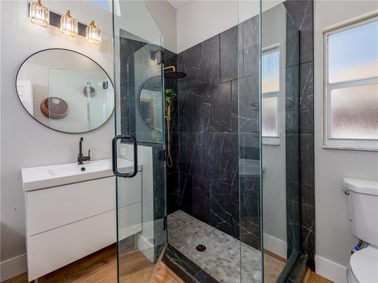 Bathroom, Glass Shower, Interior, Marble Walls, Wood Texture Flooring