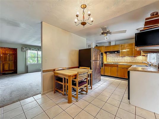 Chandelier, Dining room, Interior, Kitchen, Tile Countertops