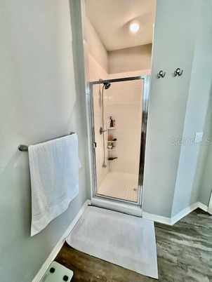 Bathroom, Glass Shower, Interior, Recessed Lighting, Wood Texture Flooring