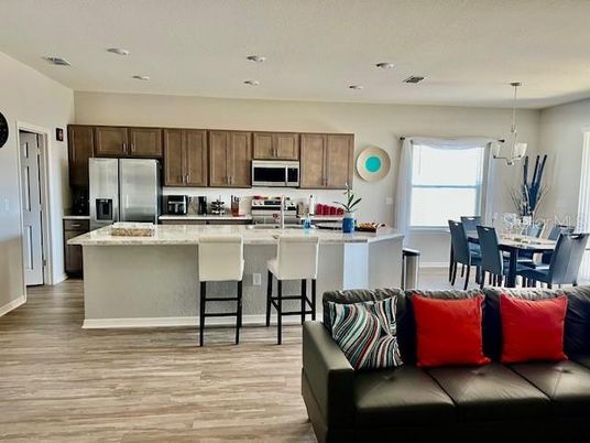 Dining room, Interior, Kitchen, Pendant Lights, Recessed Lighting, Stainless Steel Appliances, Wood Texture Flooring