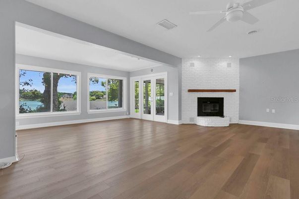 Empty room, Fireplace, Interior, Recessed Lighting, Wood Texture Flooring