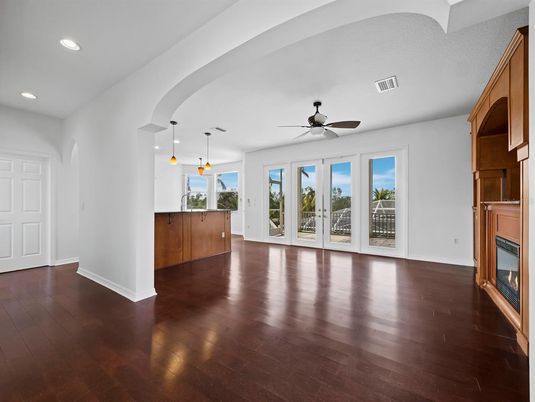 Empty room, Fireplace, Interior, Pendant Lights, Recessed Lighting, Wood Texture Flooring