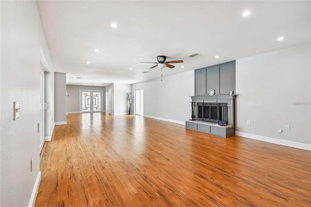 Empty room, Fireplace, Interior, Recessed Lighting, Wood Texture Flooring